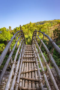 Traditional bamboo bridge for crossing river at forest at morning from different angle