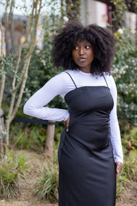 Young woman standing on field