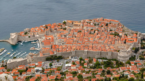 High angle view of town by sea