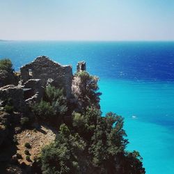 Scenic view of sea against blue sky