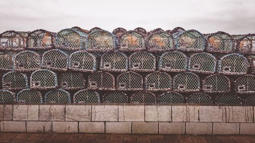 Low angle view of metal structure against sky