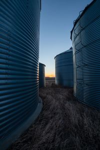 Buildings against clear sky during sunset