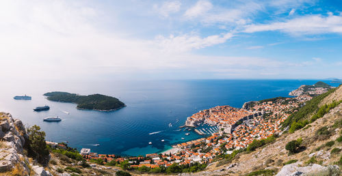 High angle view of bay against sky