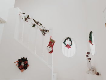 Low angle view of christmas decorations hanging