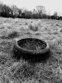 Abandoned car on field