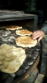 Close-up of man preparing food