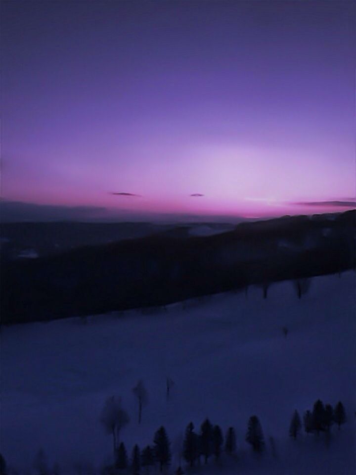 SILHOUETTE OF LANDSCAPE AT SUNSET