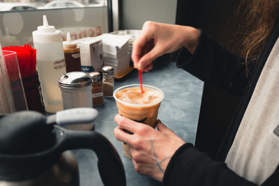 Man holding coffee cup