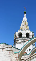 Low angle view of building against blue sky