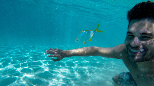 Man swimming in sea