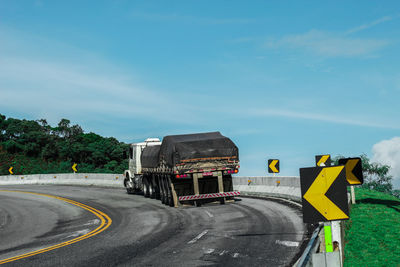 Truck on road against sky