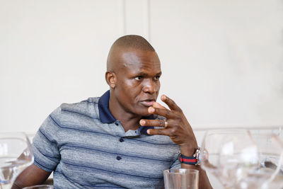 Black man during business lunch meeting