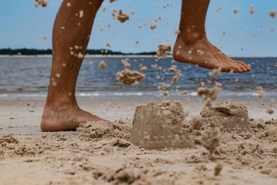 Kicki. sandcastle on the beach