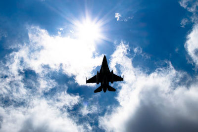 Low angle view of airplane against sky