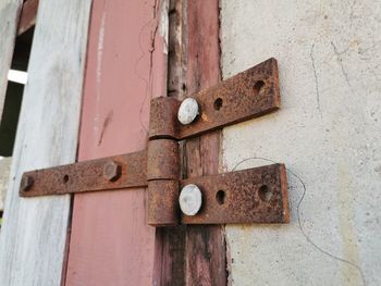 Close-up of old rusty metal door