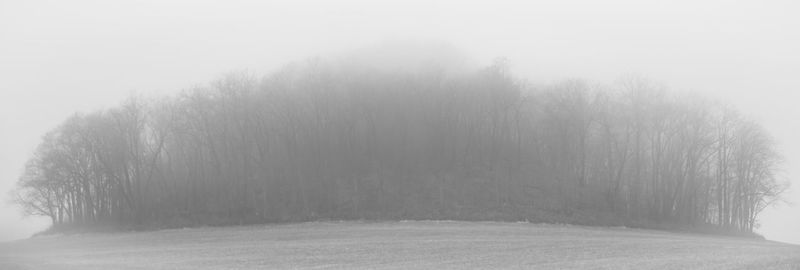 Scenic view of snowy field during winter
