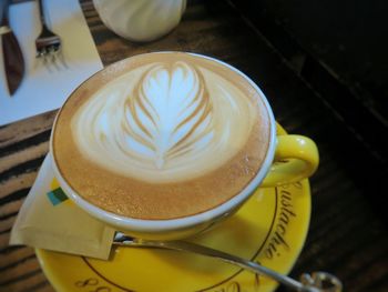 Close-up of coffee cup on table