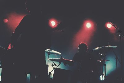 Silhouette of people at night