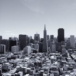 Transamerica pyramid and modern buildings in city against sky