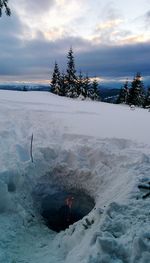 Scenic view of sea against sky during winter