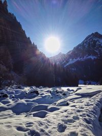 Scenic view of mountains against sky during winter