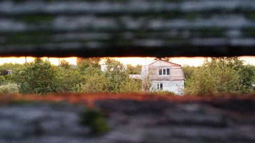 House on field against sky