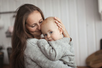 Portrait of cute baby girl at home