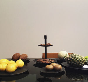 Fruits in bowl on table