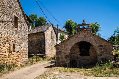 Old ruins against clear blue sky