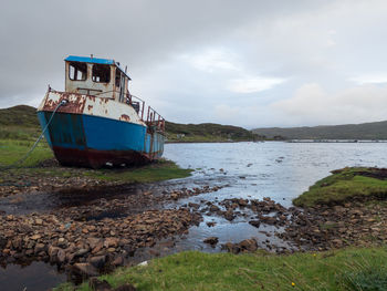 Boat on sea against sky