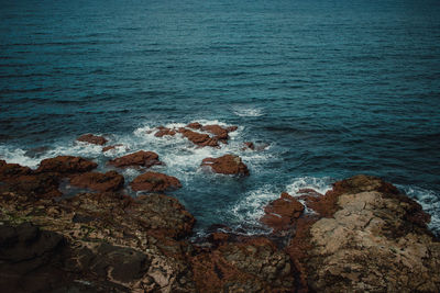 High angle view of rocks on beach