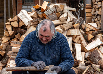 Portrait of senior man sitting outdoors