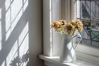 Close-up of white flower window