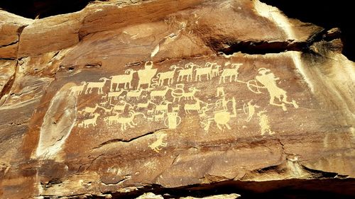 Close-up of text on rock