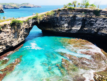 Scenic view of rock formation in sea