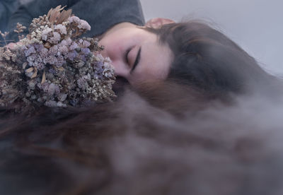 Portrait of woman with bouquet