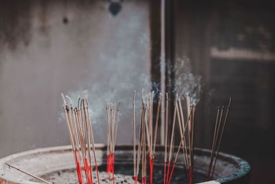 Close-up of smoke emitting from incense