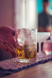 Close-up of drinking glass on table