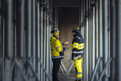 Engineers talking at building site