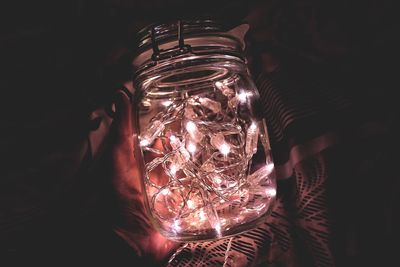 Illuminated christmas lights in jar