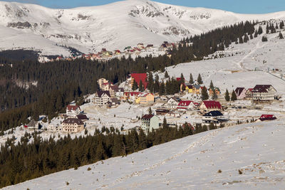 Panoramic view of snowcapped mountains against sky