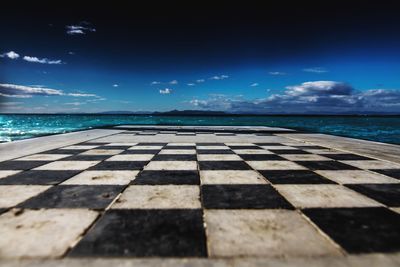 Scenic view of sea against blue sky