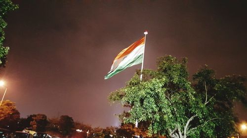 Low angle view of illuminated building at night