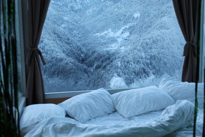 Scenic view of snow covered bed, region in adjara, georgia, view on snowy mountain from bed