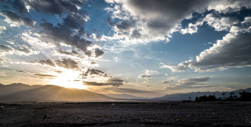 Scenic view of landscape against sky during sunset