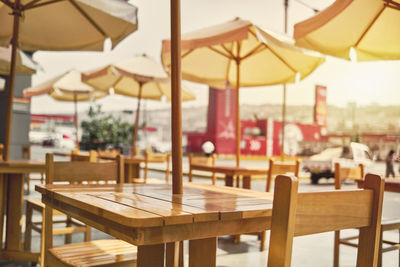 Empty chairs and table in restaurant