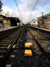 Railroad tracks against sky