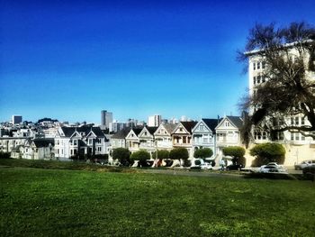 View of buildings against blue sky