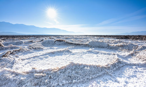 Scenic view of sea against sky during winter