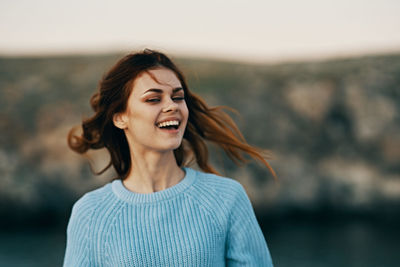 Portrait of a smiling young woman